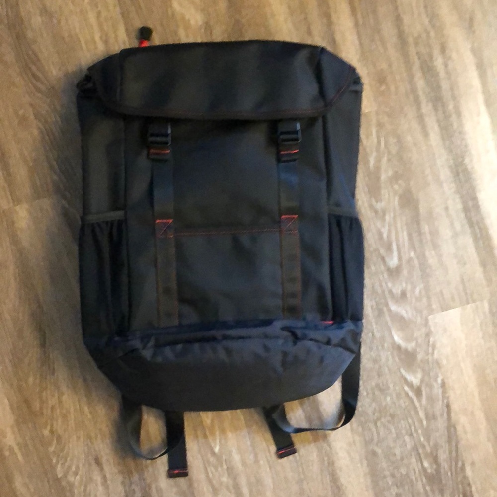 Black and red backpack. Fits laptop. Mens and womens